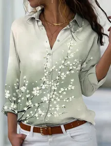 Elegant sage green long-sleeve button-down shirt with delicate white floral print.