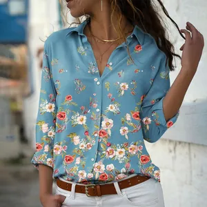 Detailed view of women's vintage floral print shirt with elegant button-down collar