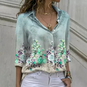 Detailed view of elegant floral print on women's loose long-sleeve button-up shirt