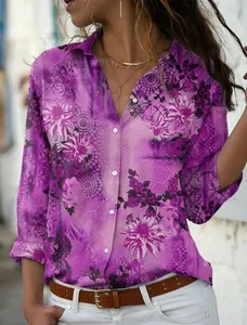 Close-up detail of women's purple floral printed long sleeve blouse with buttons