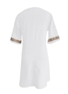 Back view of a white cotton linen casual dress with lace embroidered sleeves