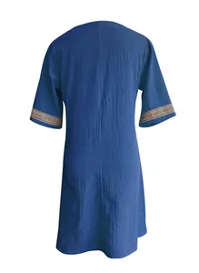 Back view of a blue cotton linen casual dress with lace trim sleeves and V-neckline