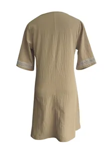 Back view of a casual khaki cotton linen dress featuring elegant lace trim on the half sleeves