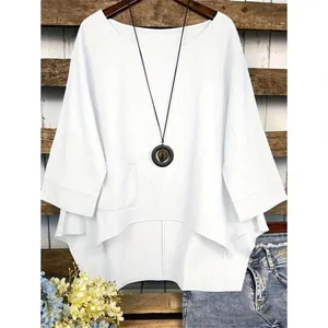 Vue détaillée de la blouse blanche pour femmes oversize en coton lin à ourlet asymétrique