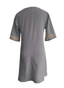 Back view of gray cotton linen casual dress with delicate lace trim on mid-sleeves