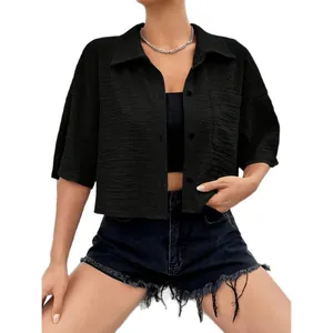 Women's stylish black textured cropped shirt featuring buttons and a front pocket