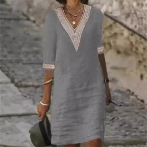 Casual grey V-neck cotton linen dress with elegant lace trim and medium sleeves.