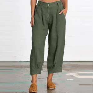 Detail of comfortable olive green loose-fit cotton linen cropped pants for women