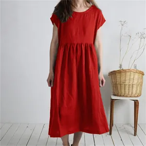 Loose fit red cotton linen midi dress with round neck and pleated waist detail.