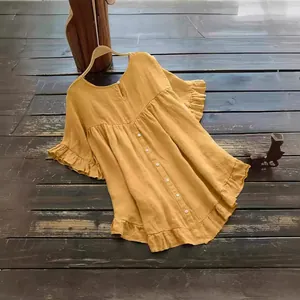 Blouse d'été ample en coton et lin jaune moutarde avec ourlet et poignets à volants