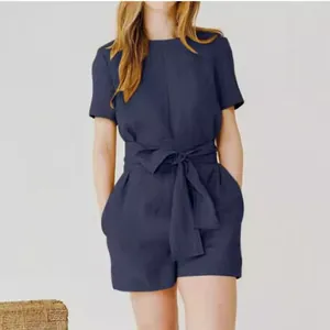 Combinaison élégante en coton et lin bleu marine avec ceinture et poches latérales