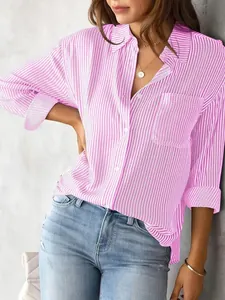 Close-up of pink and white vertical striped long-sleeved casual blouse with pocket