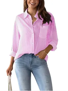 Woman wearing a pink and white vertical striped long-sleeve casual shirt with blue jeans