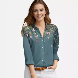 Elegante groenblauwe blouse met bloemenprint, lange mouwen en reverskraag voor dames