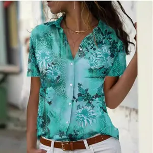Vibrant turquoise floral print short sleeve button-down blouse with lapel collar for women.