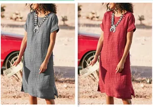 Detailed view of breathable textured fabric and stylish side slits on women's casual dress