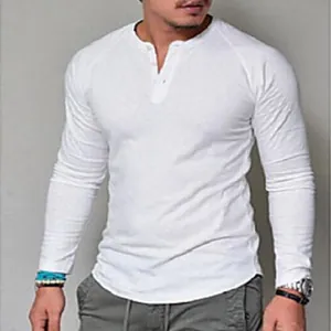Close-up of men's white cotton long sleeve Henley t-shirt with button neck detail