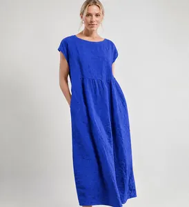 Vibrant blue sleeveless loose cotton linen dress featuring convenient side pockets.