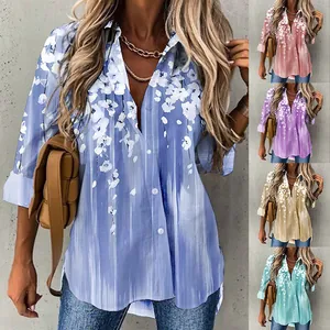 Plus size women's floral print long sleeve shirt in blue pink purple and green colors