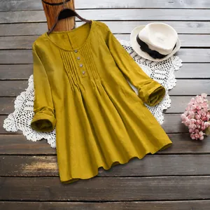 Mustard yellow cotton linen tunic blouse with pleated front and button placket detail