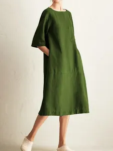 Elegant green cotton linen midi dress with pockets and half sleeves for women.
