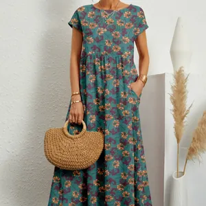 Vestido largo de algodón y lino con estampado floral, cuello redondo y bolsillos