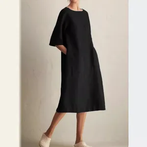 Elegant casual black cotton linen midi dress with pockets and mid-sleeves for women