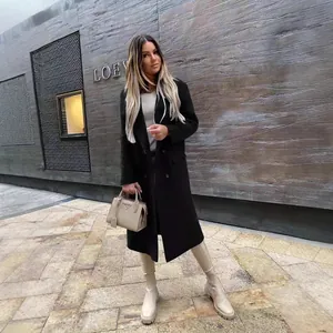 Chic women's double-breasted black wool coat with lapel collar for autumn and winter