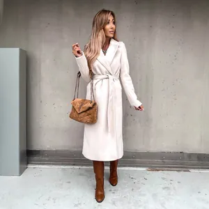 Elegant minimalist white long wool coat with waist belt and V-neck for stylish women