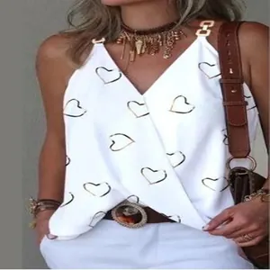 Close-up of a women's summer V-neck camisole featuring gold heart prints and metal ring straps