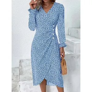 Blue floral v-neck wrap dress with ruffle puff sleeves and irregular hem detail