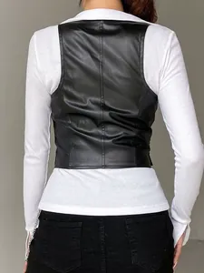Back view of a stylish black faux leather vest for women layered over a white shirt