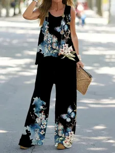 Elegant two-piece summer outfit featuring butterfly print tank top and wide-leg pants