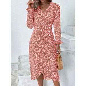 Elegant terracotta floral print V-neck dress with button details and irregular wrap hemline