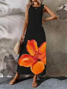 Sleeveless black maxi dress with a bold orange floral print, ideal for summer beach wear