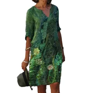 Vestido midi bohemio con estampado floral, cuello en V y media manga en tonos verdes