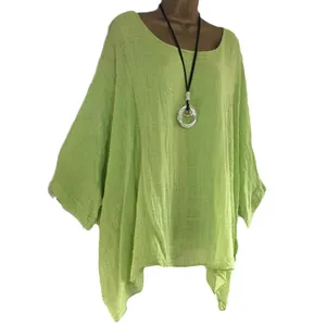 Stylish lime green oversized irregular hem blouse shirt for women shown on a mannequin