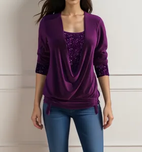 Detail view of purple sequin cowl neck top with long sleeves and ruched hem.