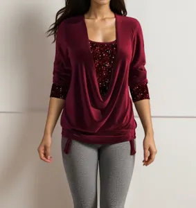 Close-up detail of the sparkling red sequins and cowl neck on this wine red top