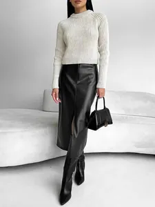 Stylish high waisted black faux leather midi skirt with front slit for autumn fashion