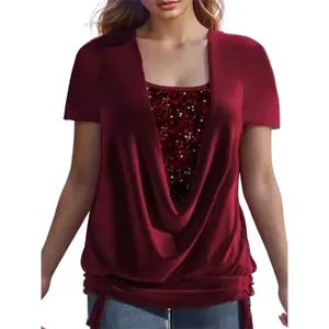 Close-up detail of burgundy cowl neck top with shimmering sequin inner layer and ruching
