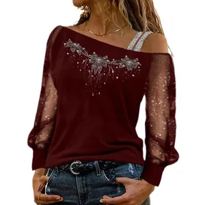 Elegant women's burgundy off-shoulder long sleeve top with shiny floral pattern design
