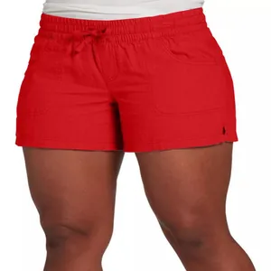 Close-up detail of women's red high-waisted loose wide-leg shorts with drawstring waist