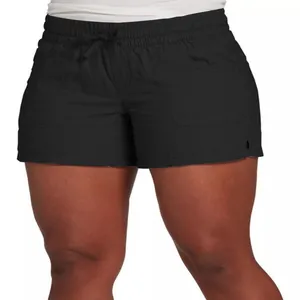 Close-up detail of high-waisted black drawstring wide-leg shorts with pockets for women