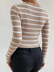 Back view detail of a slim-fit long-sleeved striped ribbed knit top in beige and white colors