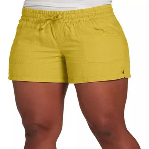 Detail view of mustard yellow high-waisted linen shorts with drawstring waist and pockets