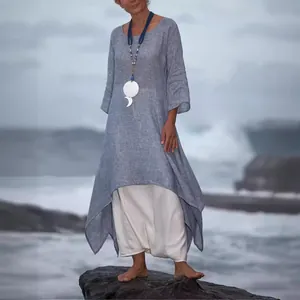 Bohemian loose blue linen dress with asymmetric hem and white layering pants