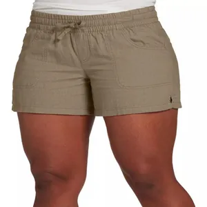Detail shot of high-waisted khaki drawstring shorts with front patch pockets for women.