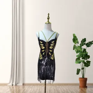 Elegant velvet fringe dress with golden butterfly motif and spaghetti straps.