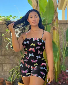 Sexy women's black camisole jumpsuit featuring vibrant colorful butterfly print detail